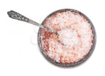 top view of old silver salt cellar with spoon with pink Himalayan Salt isolated on white background