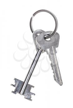 pair of door keys on keyring isolated on white background