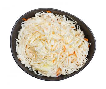 top view of Russian sauerkraut (sour cabbage pickled with carrots and served as salad) in black bowl isolated on white background