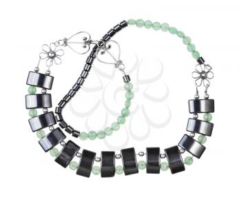 tangled hand crafted necklace from green jade, black hematite and silver beads isolated on white background