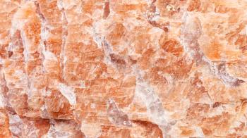 panoramic background from polished natural brown Pegmatite rock close up