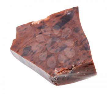 closeup of sample of natural mineral from geological collection - rough Mahogany Obsidian rock isolated on white background