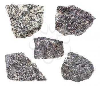 set of various nepheline syenite rocks isolated on white background