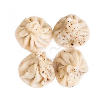 georgian cuisine - top view of four peppered khinkali isolated on white background