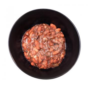georgian cuisine - top view of lobio (spicy appetizer from stewed beans) in black bowl isolated on white background