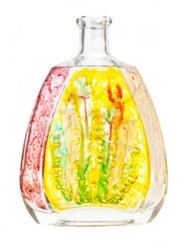 glass painting - handpainted glass brandy bottle with picture of flowers isolated on white background
