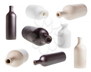 set of various ceramic bottles isolated on white background
