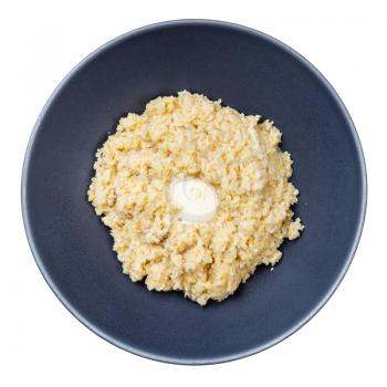 top view of buttered porridge from crushed polished wheat in gray bowl isolated on whitte background