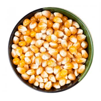 top view of raw maize corns in round bowl isolated on white background