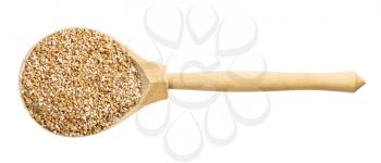 top view of wood spoon with uncooked wheat groats (crushed partly hulled wheat grains) isolated on white background