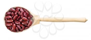 top view of wood spoon with red kidney beans isolated on white background