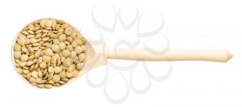 top view of wood spoon with raw whole light green lentils isolated on white background