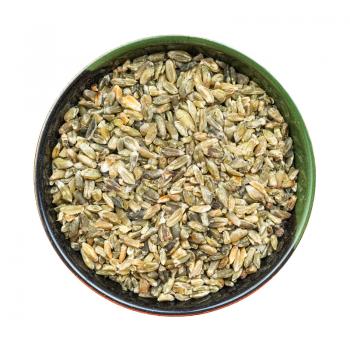 top view of freekeh wheat grains seeds in round bowl isolated on white background