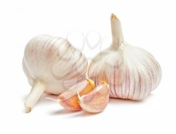 Two garlic bulbs and cloves isolated on white background