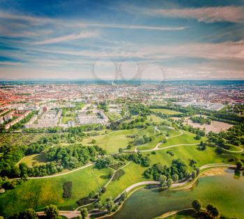 Vintage retro hipster style travel image of aerial view of Olympiapark and Munich from Olympiaturm (Olympic Tower). Munich, Bavaria, Germany