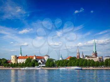 View of Riga over Daugava river: Riga Castle, St. James's Cathedral, St. Peter's Church. Riga, Latvia
