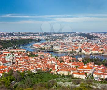 Aerial view of Charles Bridge over Vltava river and Old city from Petrin hill Observation Tower. Prague, Czech Republic