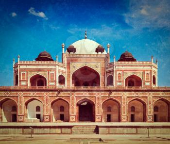 Vintage retro hipster style travel image of Humayun's Tomb with overlaid grunge texture. Delhi, India. UNESCO World Heritage Site. Frontal View
