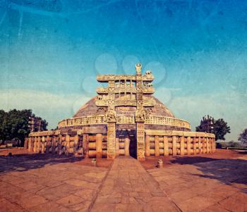Vintage retro hipster style travel image of Great Stupa - ancient Buddhist monument with overlaid grunge texture. Sanchi, Madhya Pradesh, India