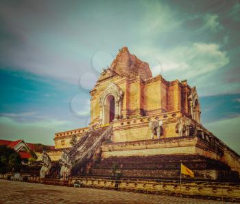 Vintage retro hipster style travel image of Buddhist temple Wat Chedi Luang. Chiang Mai, Thailand
