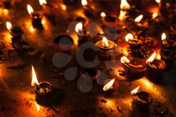 Diwali lights oil candles in Hindu temple. India