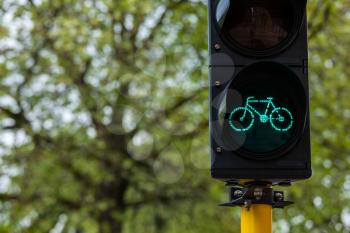 Bicycle ecological transport concept background - Bicycle traffic light in Europe. Brugge, Belgium