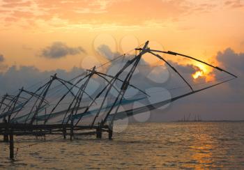 Kochi chinese fishnets on sunset. Fort Kochin, Kochi, Kerala, India