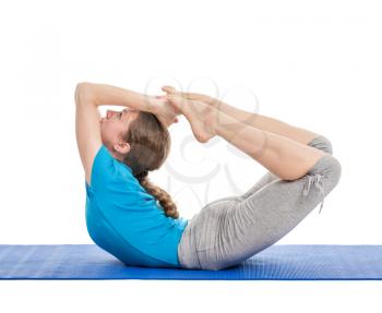 Yoga - young beautiful slender woman yoga instructor doing Bow pose (Balancing on abdomen in the shape of a bow) (rocking dhanurasana) asana exercise isolated on white background