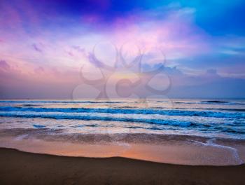 Peaceful ocean sunrise on beach