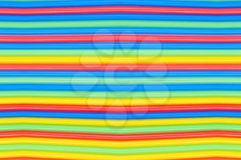 Multicolored cocktail straw suitable as abstract background.