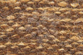 Brown camel wool fabric texture taken closeup suitable as background.