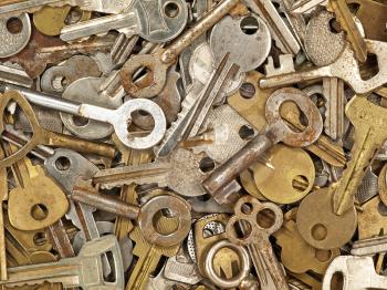 A lot of old metal keys taken closeup as background.