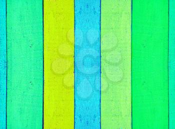 Multicolored wooden fence as abstract background.