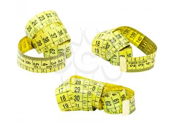 Set of yellow measuring tape isolated on white background.