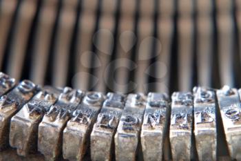 Symbols of old typewriter taken closeup.