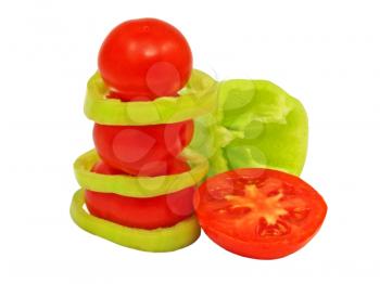 Three fresh tomatoes and  sliced pepper isolated on a white background.