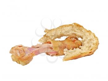 Picked chicken bone and bread garbage isolated on white background.