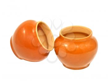 Two clay pots isolated on a white background.