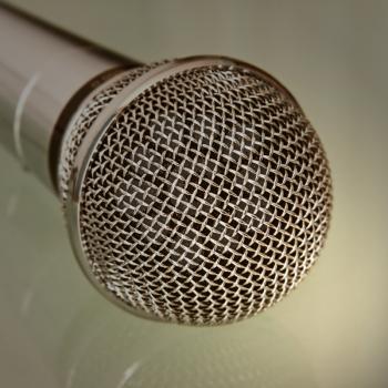 Metallic microphone taken closeup.Tonal correction.