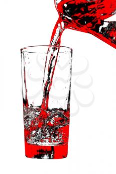 Jug pouring red liquid to glass on white background.Digitally generated image.