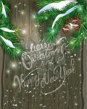 Old Wooden background with painted holiday typography, Christmas fir tree branches  and snow. Merry Christmas and Happy New Year calligraphy.