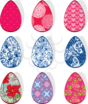 Set with Easter eggs with floral ornamental patterns, isolated on white background.