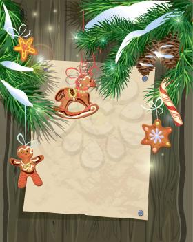 Old Wooden background with Christmas fir tree branches, gingerbread toys and snow. Vintage paper with Empty space for your text.
