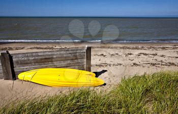 Yellow Kayak on shore on Lake Huron Ontatio