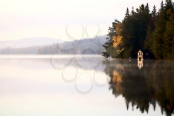 Lake in Autumn Algonquin Muskoka Ontario colors boat house