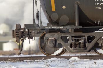 Close up rail car wheels tanker metal moving