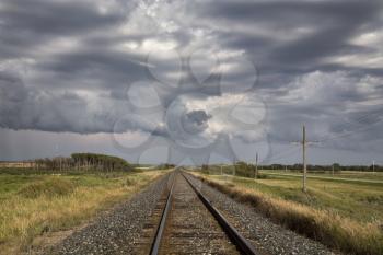 Storm Clouds Saskatchewan Prairie scene Train Tracks