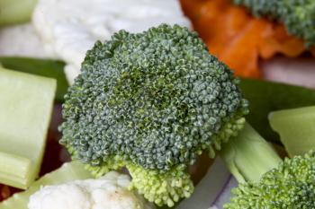 Close Up Vegetables broccoli and colliflower and onion red