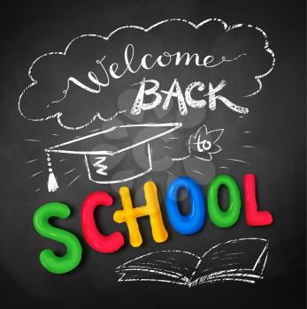Welcome Back to School poster with plasticine letters, mortarboard cap on black chalkboard background.