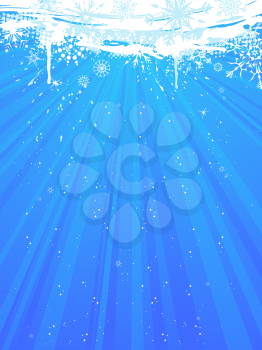 Grunge blue background with snowflakes and blobs. There is copy space for your text.